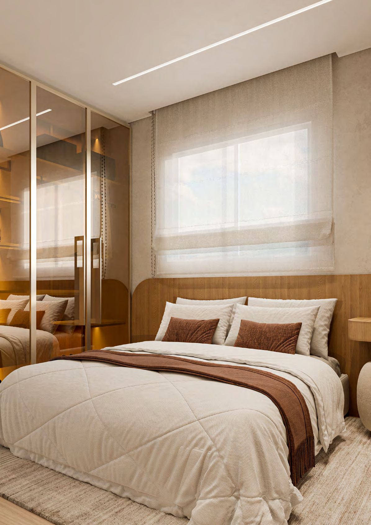 Suíte do casal decorada com cama de casal e armário espelhado